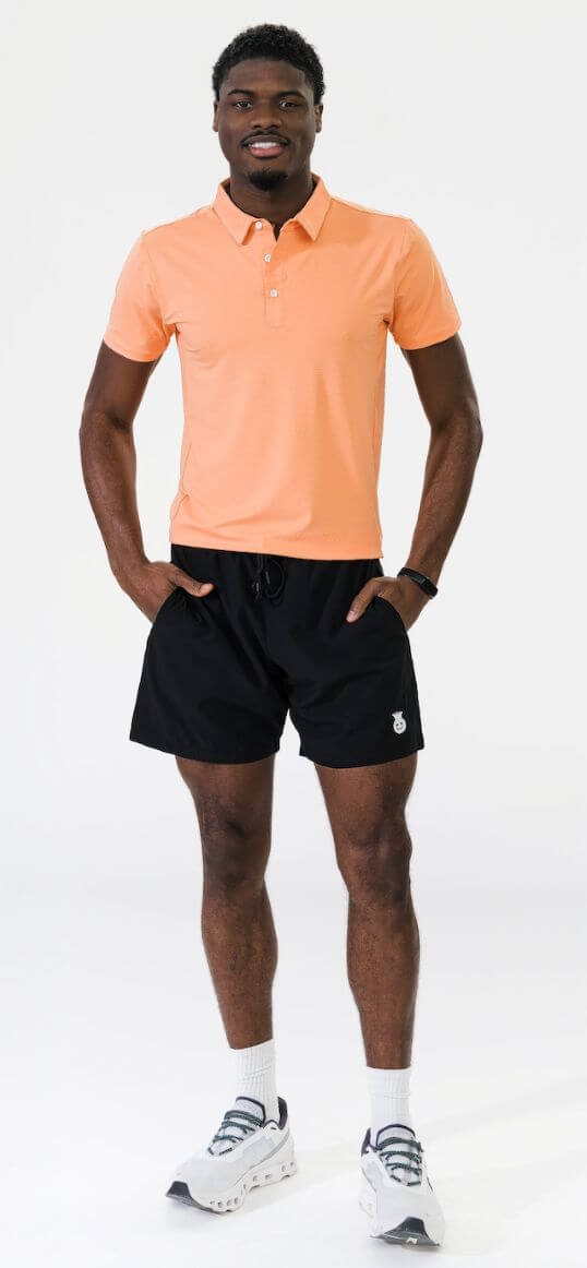 Shepard Wearing Orange Good Dink Men's Polo